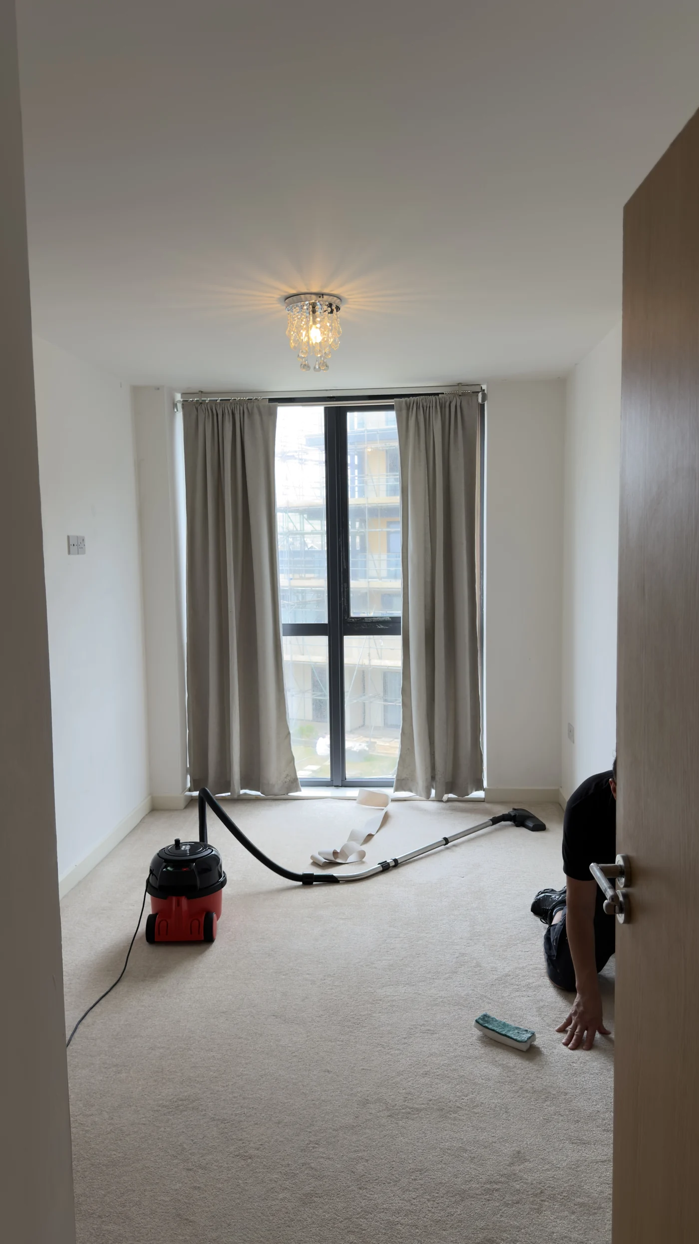 A bedroom carpet being vacuumed during an end-of-tenancy clean in Saltdean, Brighton