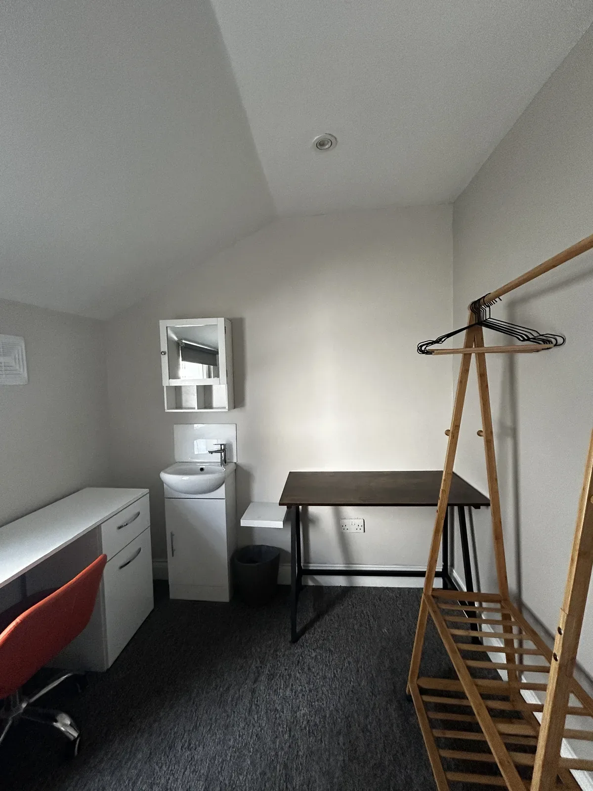 Student bedroom alt angle after clean, seven dials