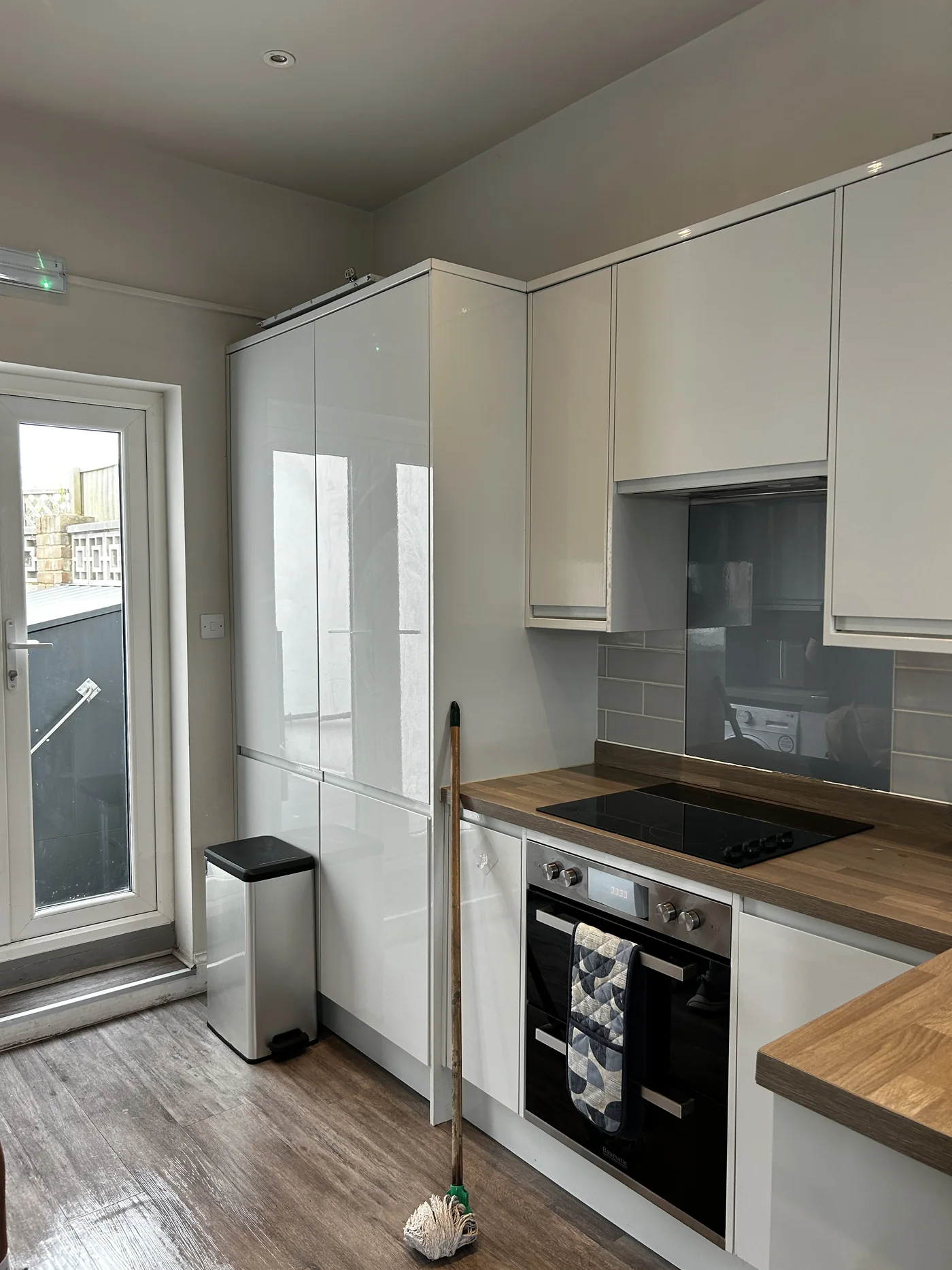Kitchen after — where five deposits are decided